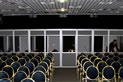 Line of Silent 9300 Audipack® mobile booths ISO 4043 AIIC CEE standards at the rear of a conference room