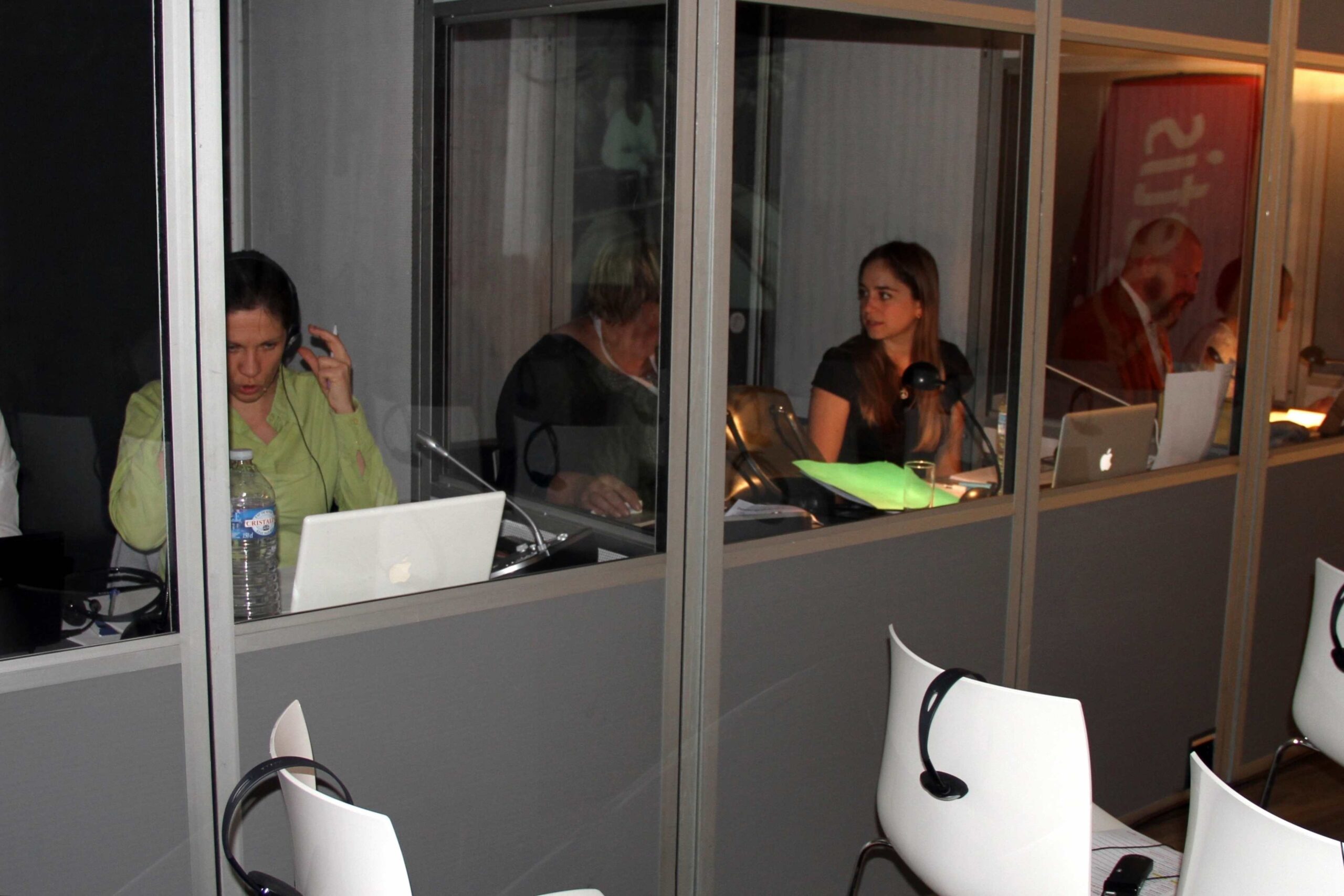 Conference interpreters at work in mobile booths